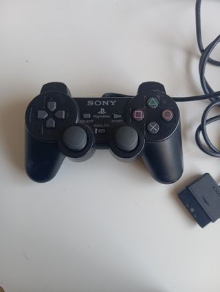 PlayStation 2 con 4juegos i un mando