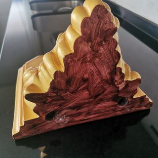 Ménsula dorada antigua