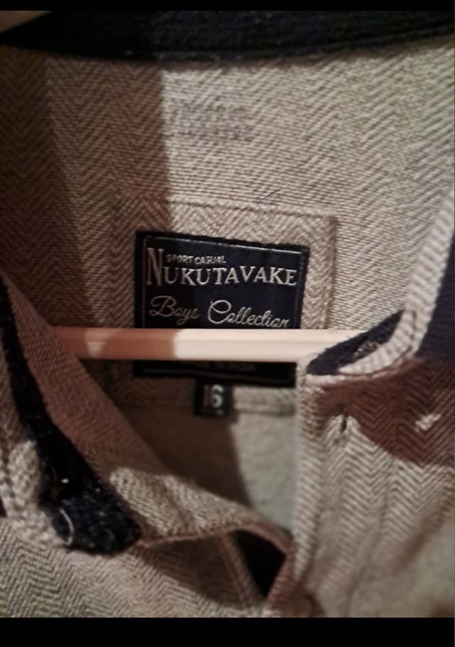 2 Polos manga larga grises y azules Nukutavake. 