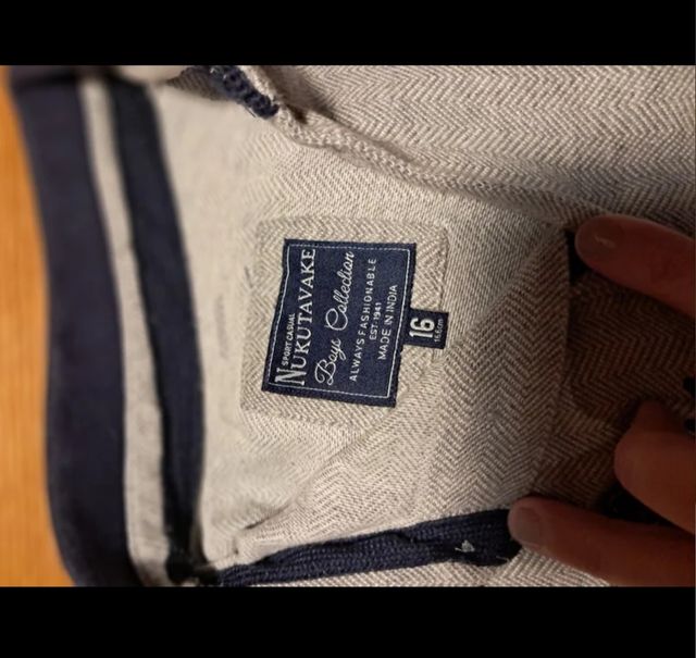 2 Polos manga larga grises y azules Nukutavake. 