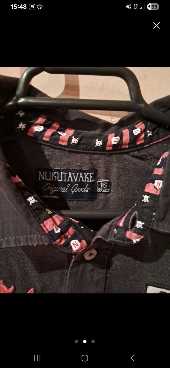 2 Polos manga larga grises y azules Nukutavake. 