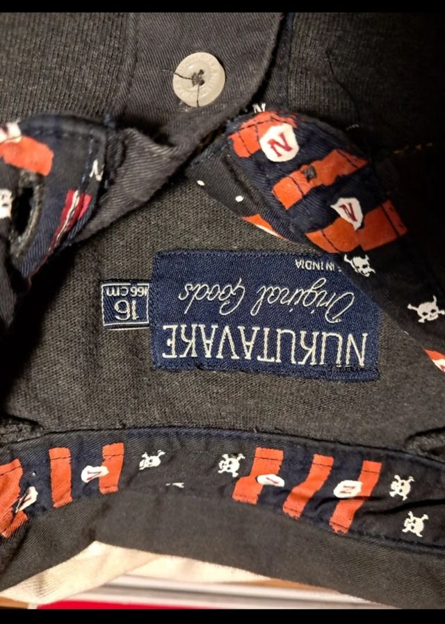 2 Polos manga larga grises y azules Nukutavake. 