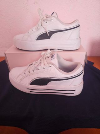 Zapatillas Puma blancas y negras