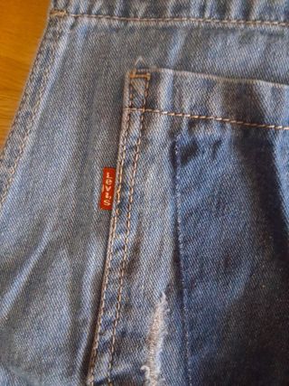 Peto vaquero corto desgastado