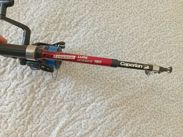 Caña y carrete pesca río