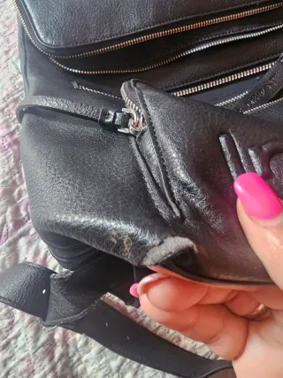 Mochila negra + cartera