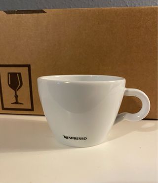 12 tazze Nespresso bianche. Nuove. Mai usate.