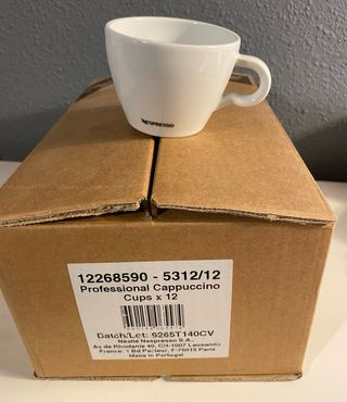 12 tazze Nespresso bianche. Nuove. Mai usate.