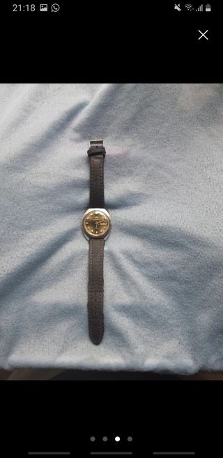Reloj Orient dorado y plateado