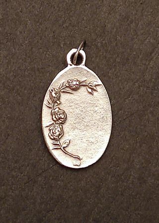 Medalla Santa Cecilia antigua