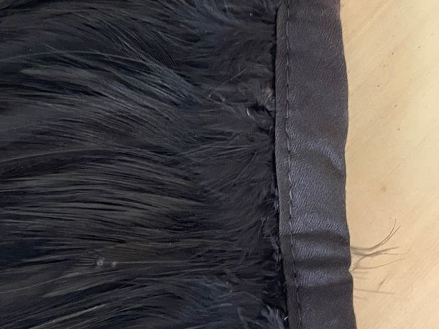 Tira plumas 1m. Tupidas. Largo 12cm. Negro.