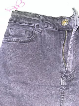 Vaqueros negros rotos