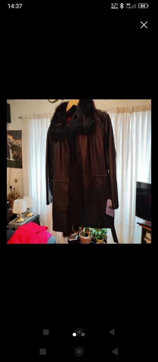 Abrigo piel negro con etiqueta