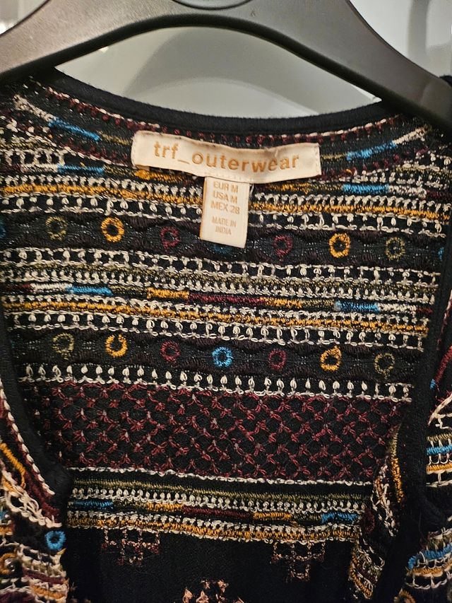 Chaleco negro largo pedrería