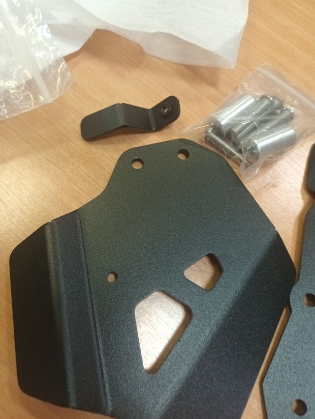 Protectores de freno trasero para moto