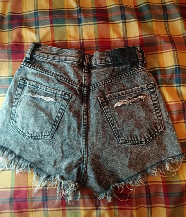 vaqueros rotos grises