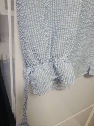Blusa rayada azul y blanca