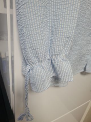 Blusa rayada azul y blanca