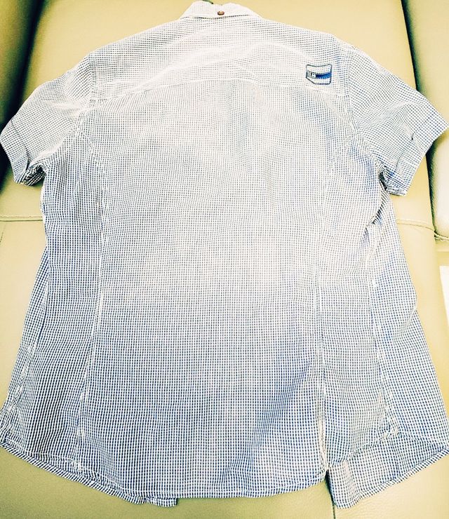 Camicia blu e bianca a quadri