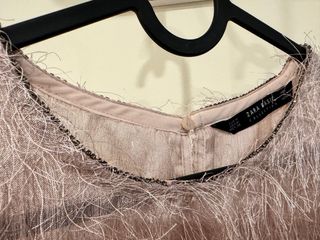 Top flecos en rosa pastel