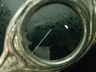 Abrecartas vintage con lupa