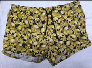 Bañador calavera dorado