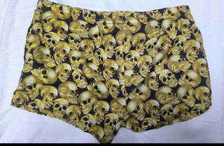 Bañador calavera dorado