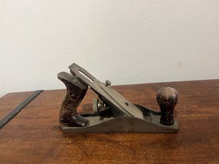 Cepillo de carpintero antiguo