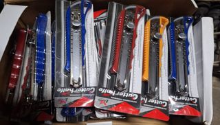 Cutters metálicos de 18 mm. NUEVOS a estrenar.