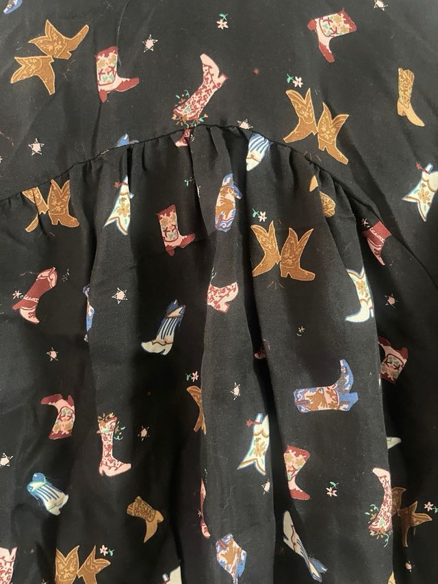 Blusa vaquera estampada con lazo