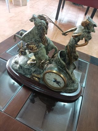 Reloj figura carroza bronce