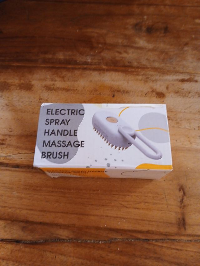 Cepillo masajeador eléctrico para mascotas