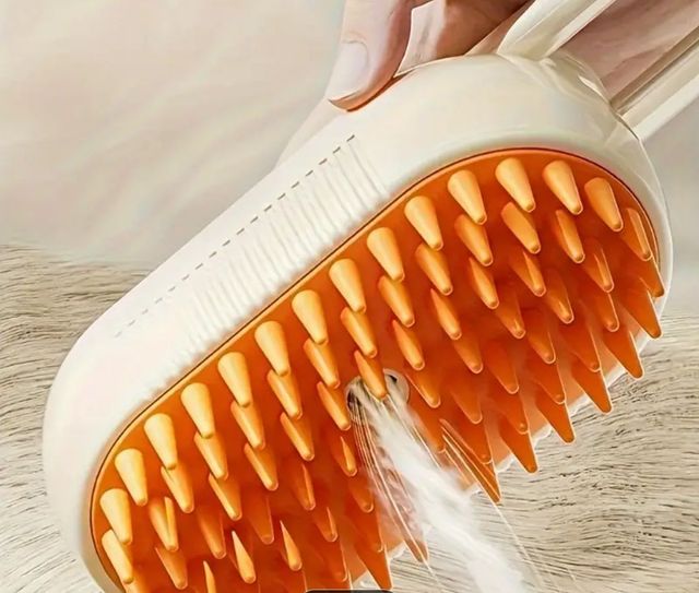 Cepillo masajeador eléctrico para mascotas