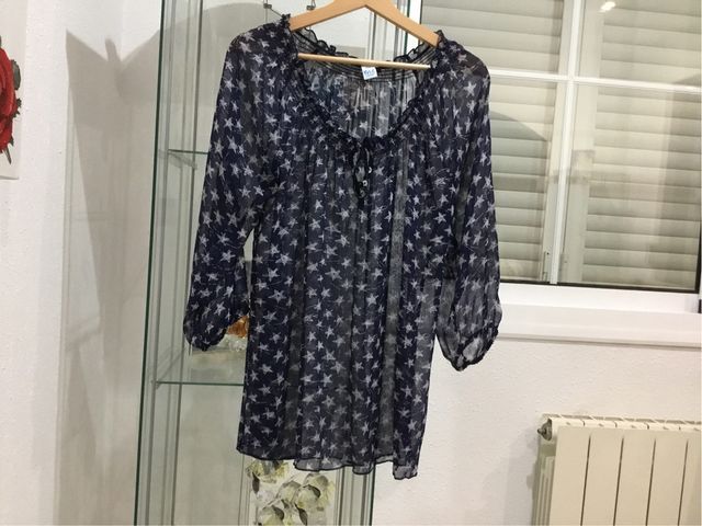 Blusa de mujer manga tres cuartos .