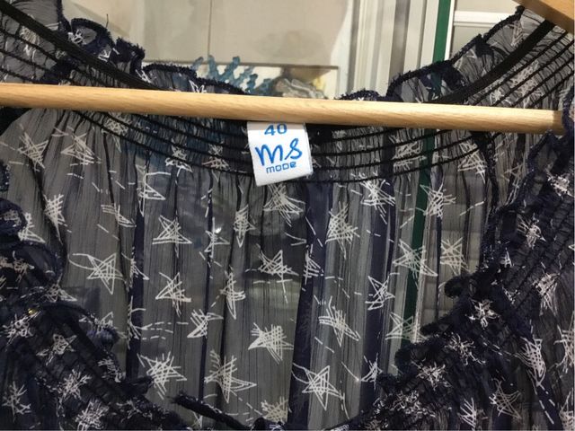 Blusa de mujer manga tres cuartos .