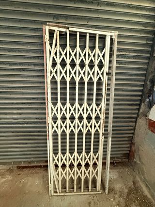 Reja plegable para puerta