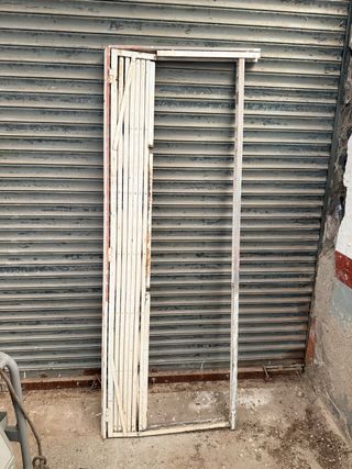 Reja plegable para puerta