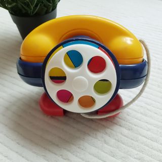 Juguete teléfono avión colores sonoro Dodotis