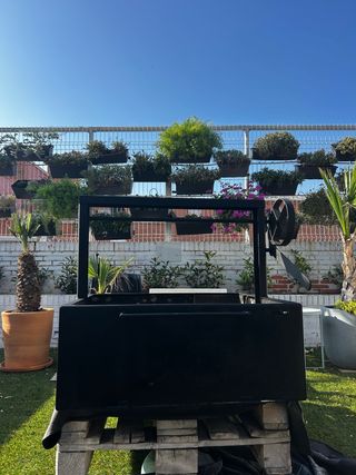 Barbacoa de leña de hierro forjado