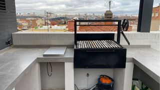 Barbacoa de leña de hierro forjado