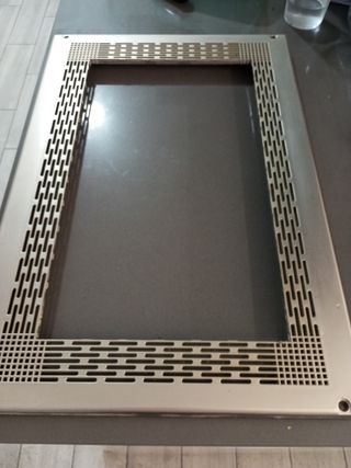 Embellecedor microondas acero