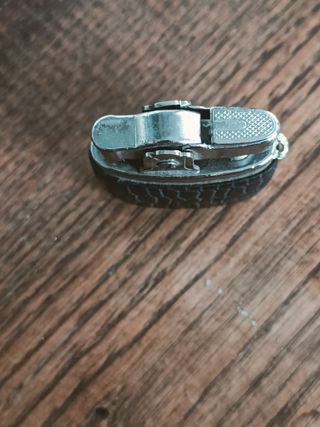 Accendino vintage, acc. metallo e pelle