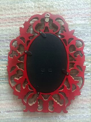 Espejo ovalado dorado antiguo