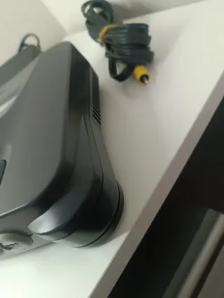 Nintendo 64 con Ocarina of Time y Pokémon Stadium