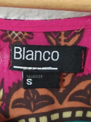 Vestido corto color fucsia con estampado talla S