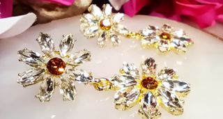 Pendientes girasol circonitas dorados