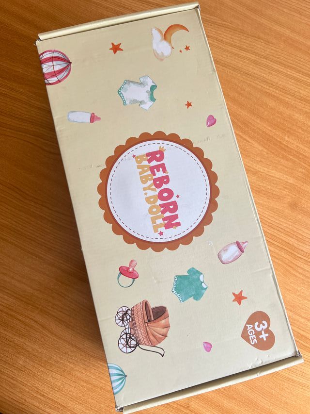 Muñeca Reborn bebé - Ropa gris