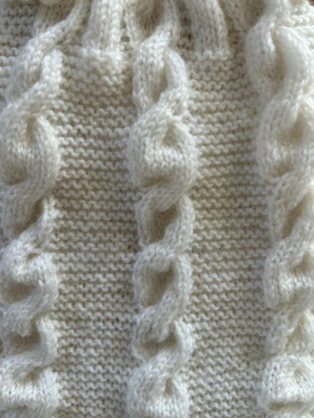 Pagliaccetto neonato lavorato a maglia