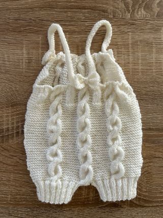 Pagliaccetto neonato lavorato a maglia
