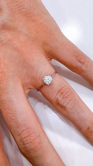 Anello solitario in oro bianco 18kt 750